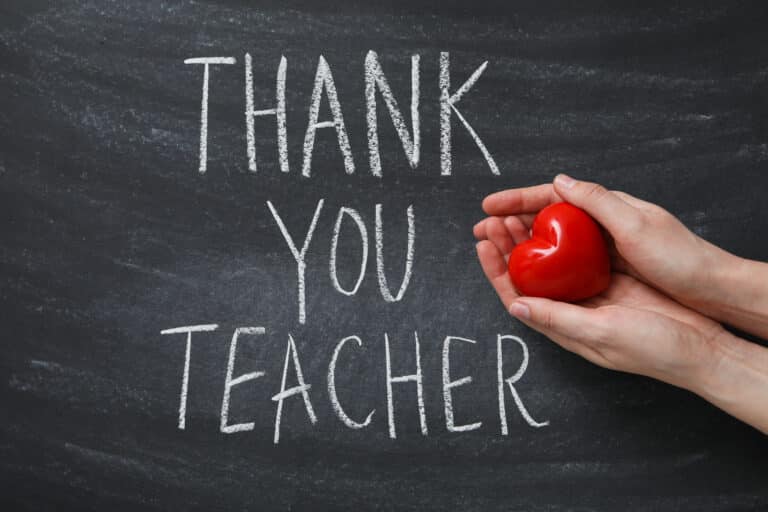 Black school board with chalk inscription "Thank you teacher!"