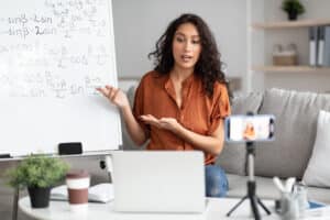 Math teacher giving virtual lecture to students using flipped classroom method