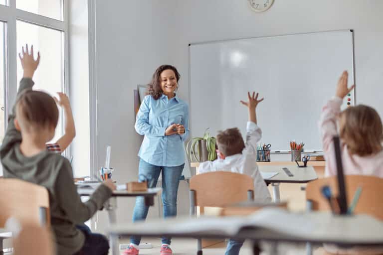 Young happy elementary school pupils professional development objectives concept