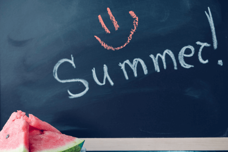 "Happy Summer!" written on a board.