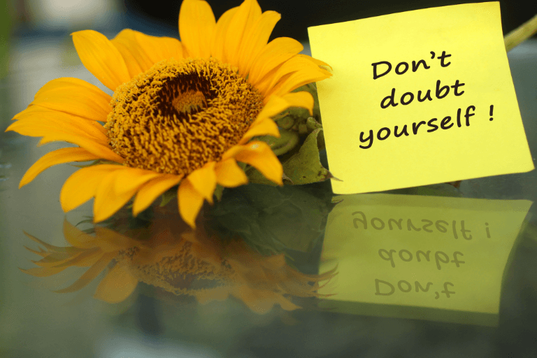 sunflower with sticky note