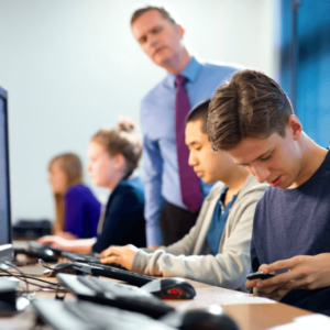 male highschool student has been spotted by a teacher using cellphone in class